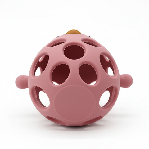 Bottom view of hollow oval lattice silicone baby teether BPA-free on white background