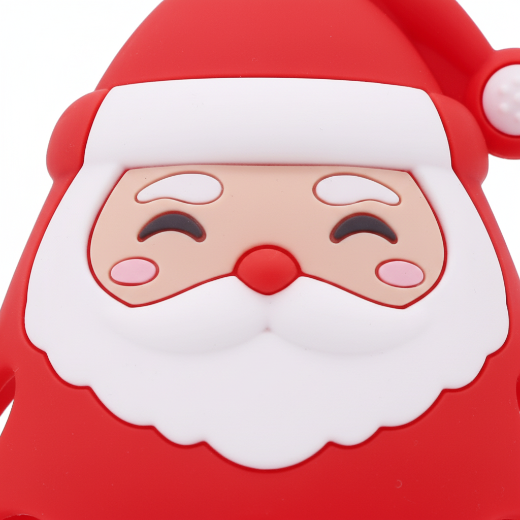 Close-up of red silicone Santa Claus baby teether face showing smiling expression, white beard and red hat, white background