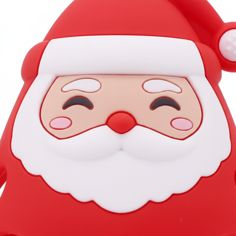 Close-up of red silicone Santa Claus baby teether face showing smiling expression, white beard and red hat, white background