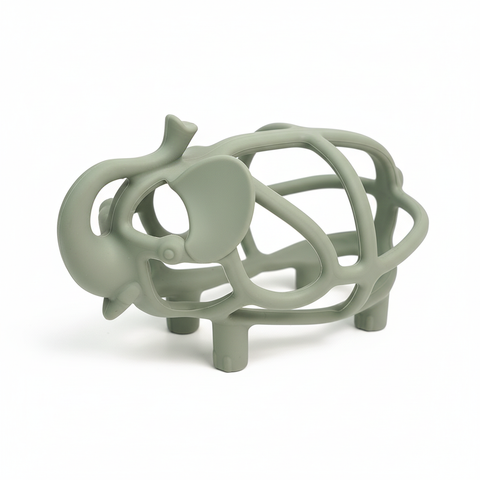 Sage green hollow elephant silicone baby teether 3/4 angle showing trunk, ear and open lattice body, white background