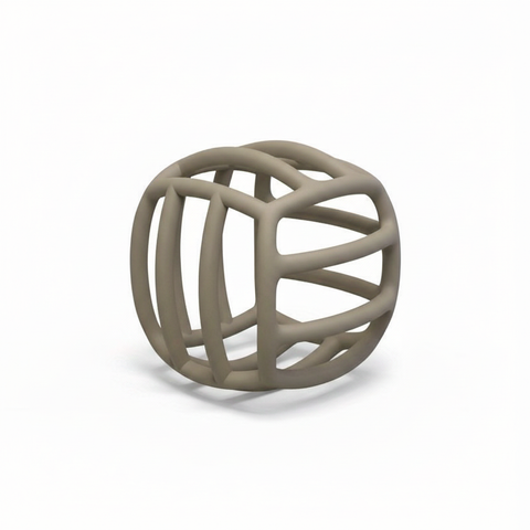 Side profile of warm taupe hollow lattice maze silicone baby teething ball, white background