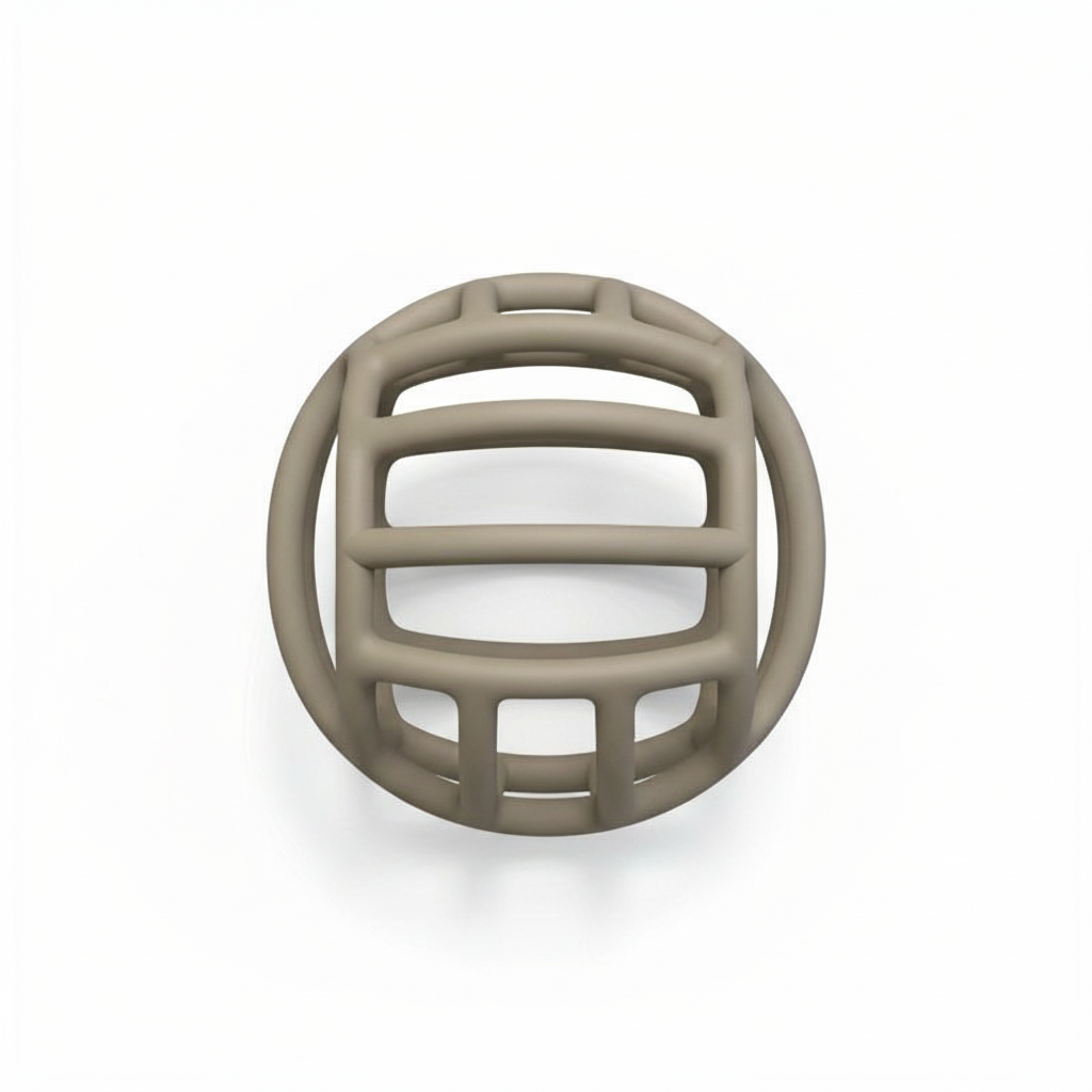 Top-down flat lay of BPA-free eco-friendly hollow maze silicone baby teether on white background