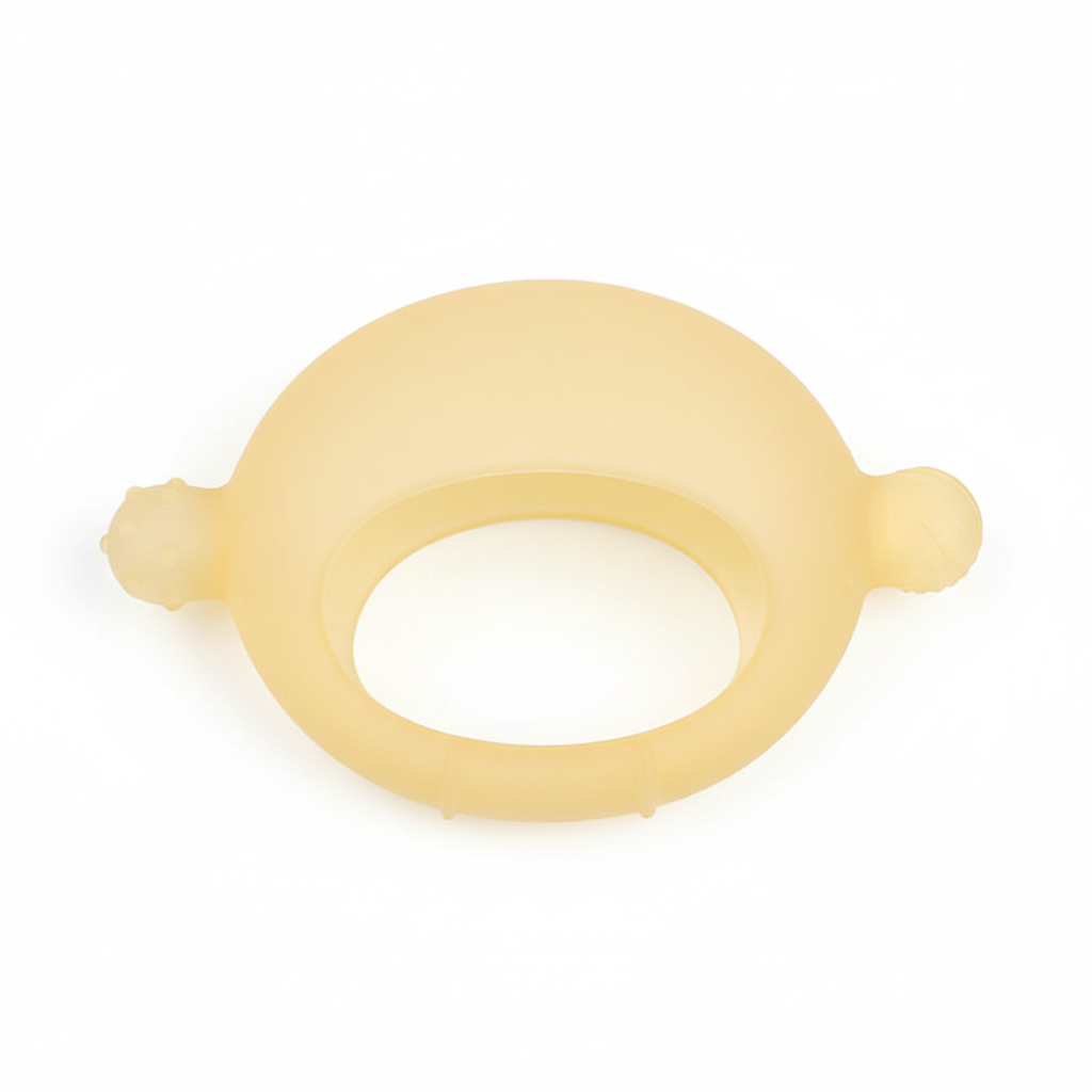 Top-down flat lay of BPA-free lemon crescent silicone infant teether on white background