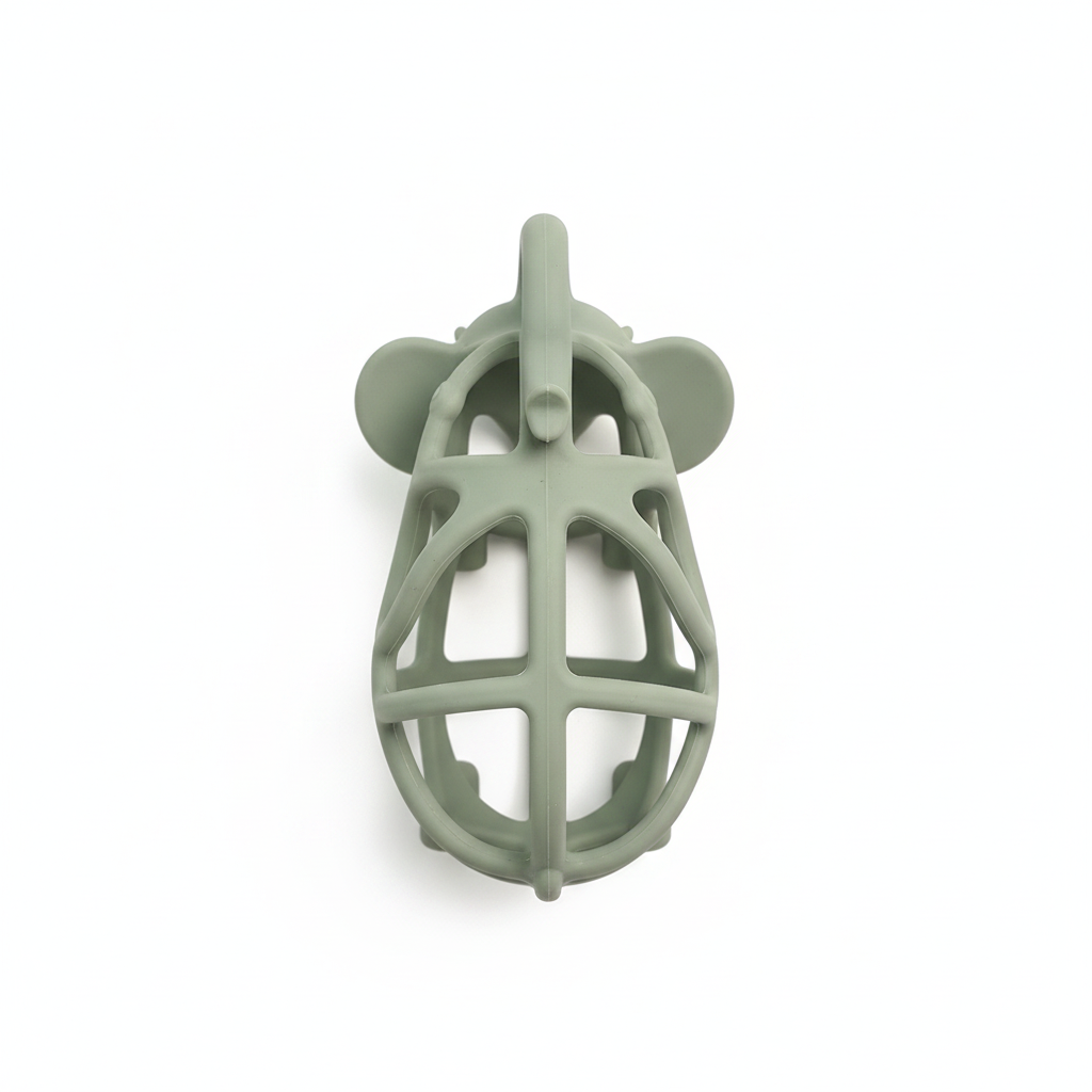 Top-down flat lay of BPA-free sage green hollow elephant silicone baby teether, white background